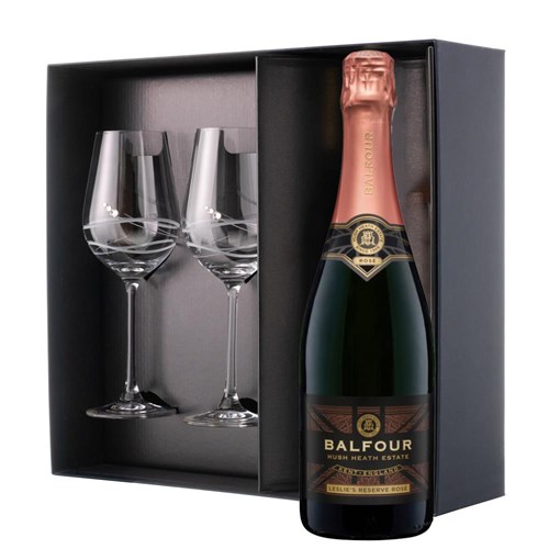 This luxurious gift set is the perfect choice for those who appreciate fine sparkling wine and refined glassware. Featuring a bottle of Balfour Leslies Reserve Rose English Sparkling 75cl paired with two exquisite Venezia Glasses adorned with Swarovski Crystals, this set is beautifully presente